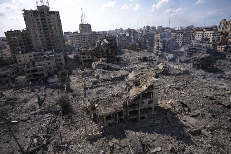 A view of the rubble of buildings hit by an Israeli airstrike, in Gaza City, on Oct. 10, 2023. After 11 weeks of war in Gaza, the Israeli military campaign against Hamas now sits among the deadliest and most destructive in history. A view of the rubble of buildings hit by an Israeli airstrike, in Gaza City, on Oct. 10, 2023. After 11 weeks of war in Gaza, the Israeli military campaign against Hamas now sits among the deadliest and most destructive in history.