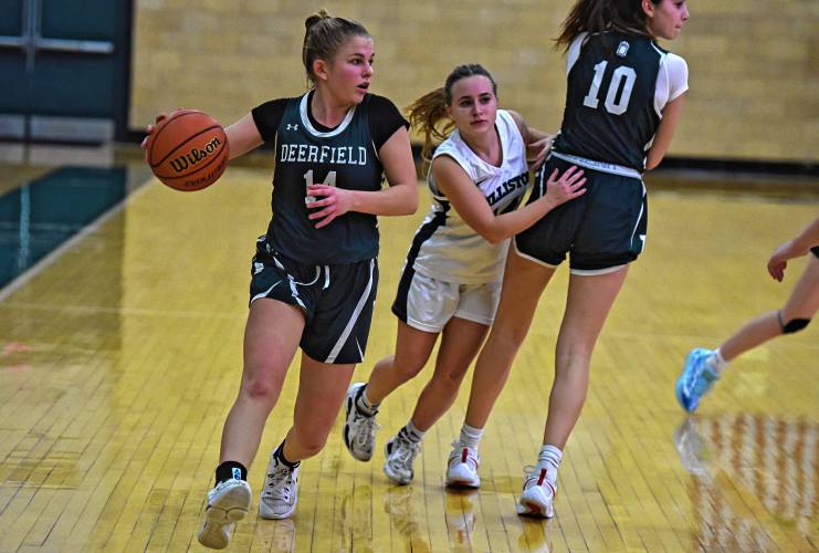 Deerfield Academy’s Anna Dyjach (14) dribbles against Williston during NEPSAC action in Deerfield on Wednesday.