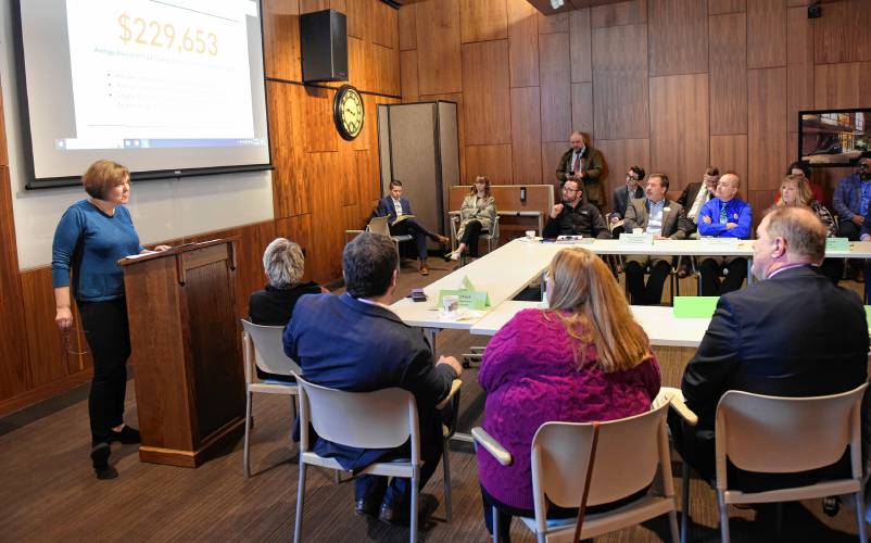 Linda Dunlavy, executive director of the Franklin Regional Council of Governments, speaks to those gathered at the John W. Olver Transit Center in Greenfield on Monday for a meeting with state Department of Transportation Secretary Monica Tibbits-Nutt.