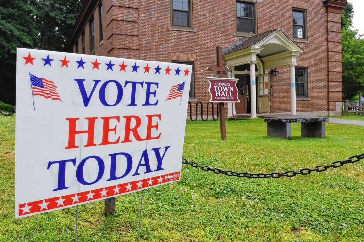Voting at Conway Town Hall on Thursday.