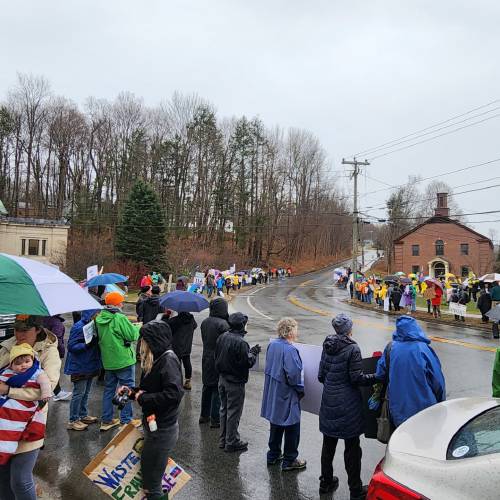 Protesters gather along Route 116 in Conway on Saturday as part of “Hands Off!,” a national mobilization day in which residents held demonstrations to rally against actions taken by President Donald Trump and billionaire Elon Musk, and executive orders and policies put in place, since January.