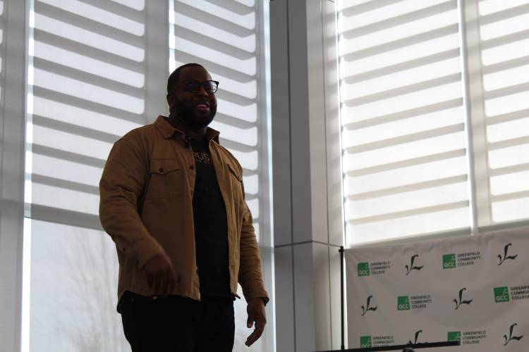 Author and keynote speaker Kwamane Harris speaks at Greenfield Community College’s Martin Luther King Jr. Day celebration in 2023. This year’s keynote speaker is GCC alumna La Wanza Lett-Brewington.
