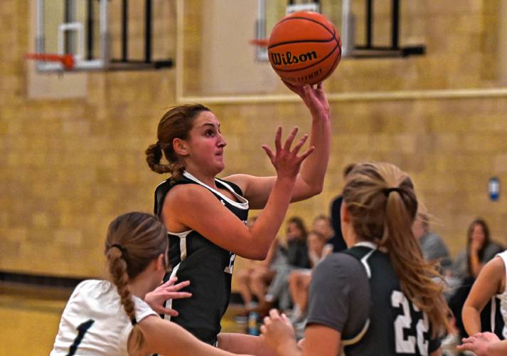 Deerfield Academy’s Avery Izzo (12) drives against Williston during NEPSAC action in Deerfield on Wednesday.