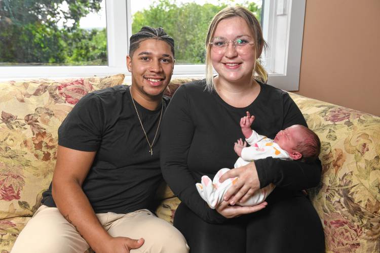 Malik Adams and Carolyn Gilmore with their baby, Lucia Adams, who was born Aug. 21 in an SUV on Route 2 in Gill.