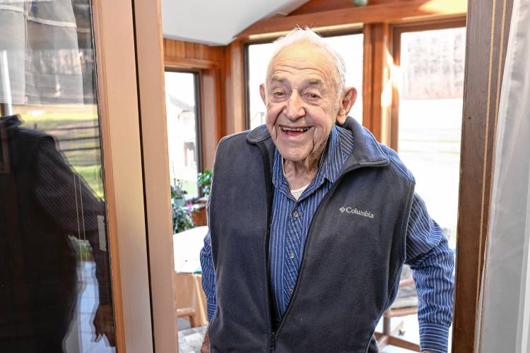 Russell Deane, 96, in the sunroom of his Bernardston home.