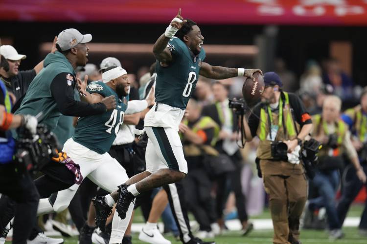 Philadelphia Eagles safety C.J. Gardner-Johnson (8) and fullback Khari Blasingame (48) celebrate after a win over the Kansas City Chiefs in the NFL Super Bowl 59 football game, Sunday, Feb. 9, 2025, in New Orleans. (AP Photo/George Walker IV)