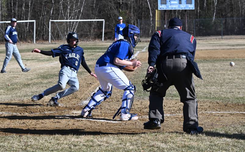 Franklin Tech’s Nick Prasol arrives at home before the throw makes it to Turners Falls catcher Trevor Lyons at Franklin Tech on Tuesday. 