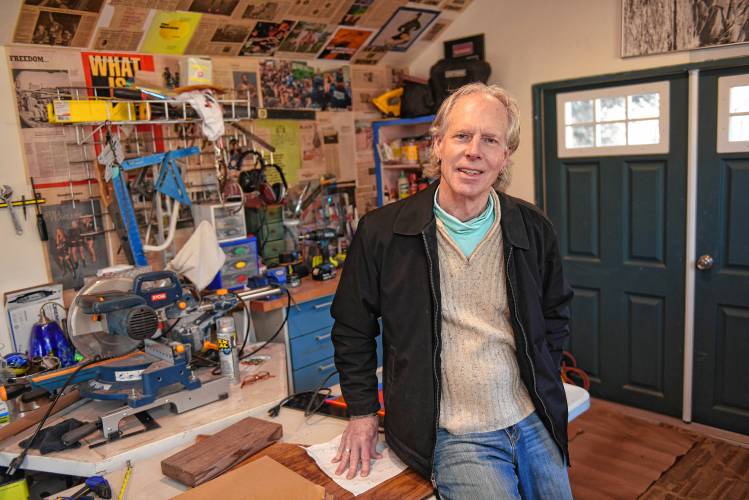 Joseph “JJ” White in his art studio behind his Greenfield home.