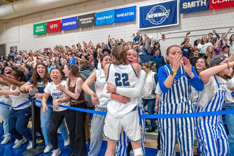 Smith players celebrate with the crowd after winning the NCAA Division 3 Women's Basketball tournament Round of 32 game against Amherst 52-50 at Ainsworth Gym, Saturday.