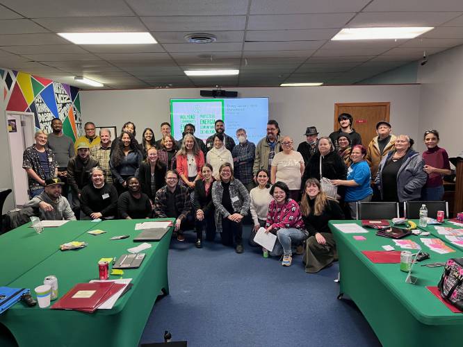 A group of University of Massachusetts researchers, graduate students and Holyoke community members after the first Community Holyoke Energy project workshop in 2024. 