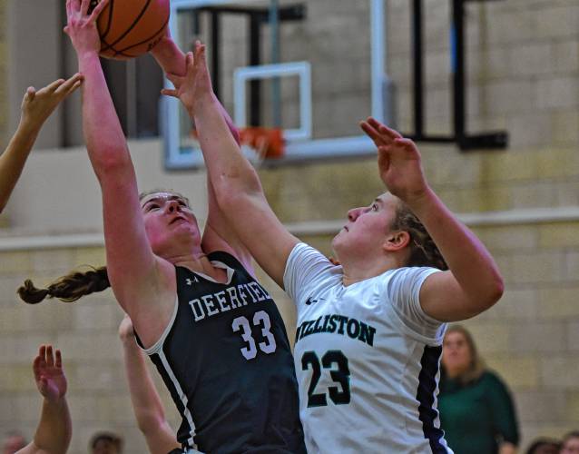 Deerfield Academy’s Charlotte Coody (33) and Willistons Skyler Walker (23) battle for a rebound during NEPSAC action in Deerfield on Wednesday.