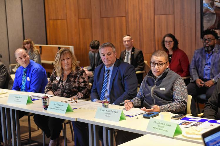 Massachusetts Department of Transportation Secretary Monica Tibbits-Nutt, right, speaks at the John W. Olver Transit Center in Greenfield on Monday.