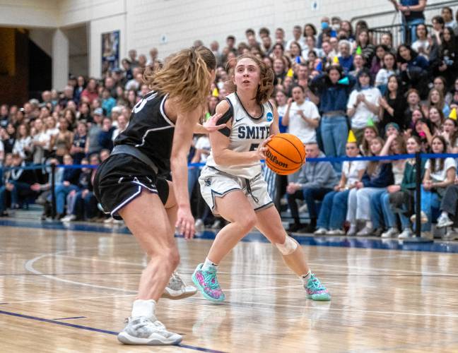 Smith guard Ally Landau, right, looks to attempt a shot during the NCAA Division 3 Women's Basketball tournament Round of 32 game against Amherst at Ainsworth Gym, Saturday.