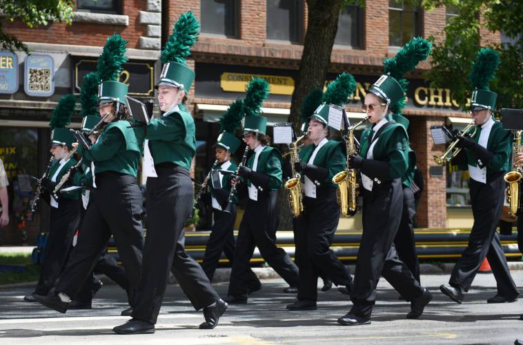 The Greenfield High School Band on Main Street during Memorial Day activities in Greenfield Monday.