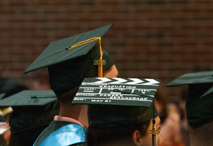 Greenfield High School graduate Parker Beauregard decorated their cap's motarboard for the high school graduation on Saturday.