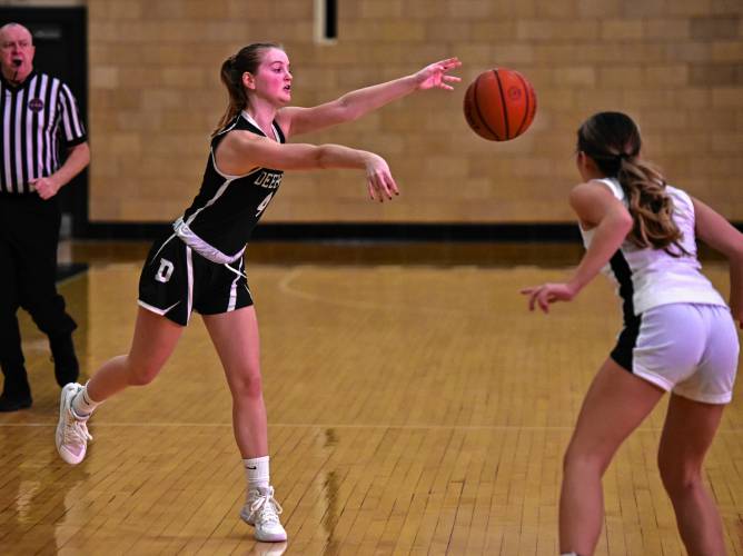 Deerfield Academy’s McKenzie Goltermann (4) makes a pass against Williston during NEPSAC action in Deerfield on Wednesday.