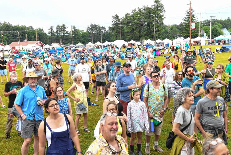 People listen to Oh He Dead play the main stage at the Green River Festival on Friday night at the Franklin County Fairgrounds after a slight rain delay. 