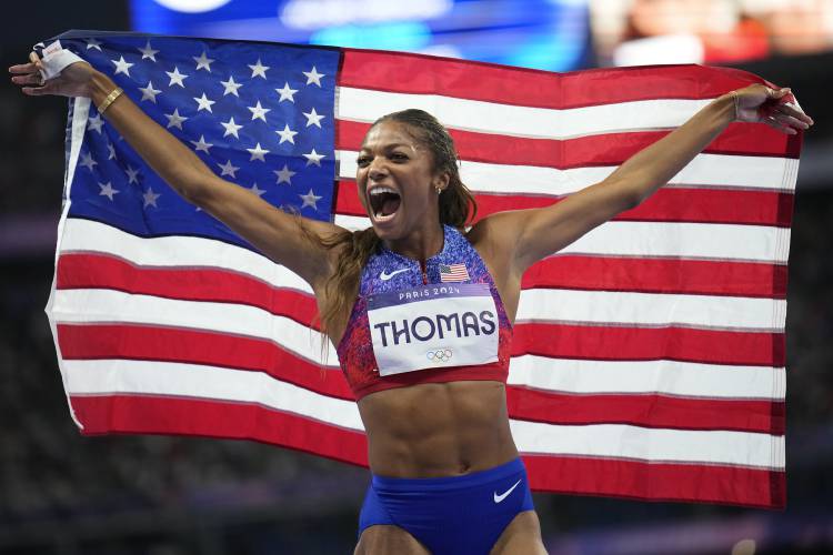 Florence’s Gabby Thomas reacts after winning the women's 200-meters final at the 2024 Summer Olympics, Tuesday, Aug. 6, 2024, in Saint-Denis, France.