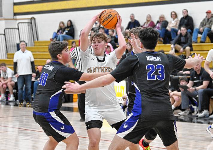 Pioneer’s Jackson Glazier looks to pass against Smith Academy during the top-seeded Panthers’ victory in the Western Mass. Class D semifinal round at Messer Gymnasium in Northfield Wednesday. 