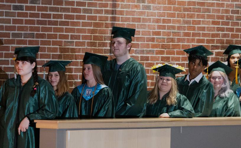 Graduates lined up to recieve their diplomas at the Greenfield High School graduation on Saturday.