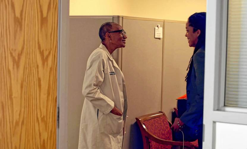 Doctors Thea James, left and Khama Ennis share a laugh in a scene from “Faces of Medicine.”