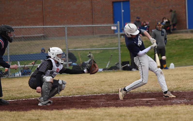 Frontier Regional’s Austin D’Urso (batting) fouls off a pitch from Hopkins pitcher Chace Earle during the Redhawks’ win on Wednesday afternoon in Hadley.