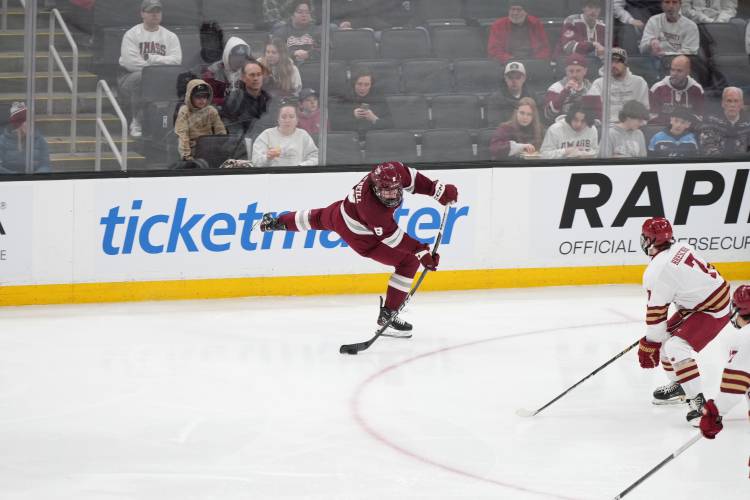 UMass' Cam O'Neill fires a shot on goal against Boston College on Friday in the Hockey East Tournament semifinals at TD Garden in Boston. 
