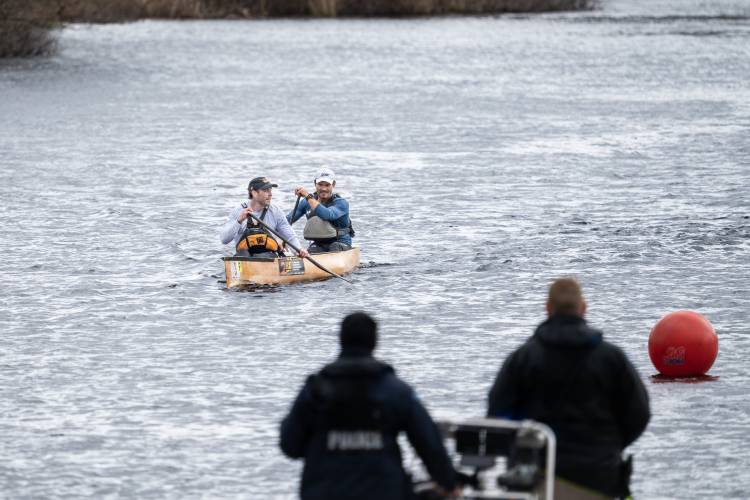 Canoe No. 3, paddled by Ryan Zaveral and Shane MacDowell, was the first to cross the finish line in the 59th running of the River Rat Race on Saturday.