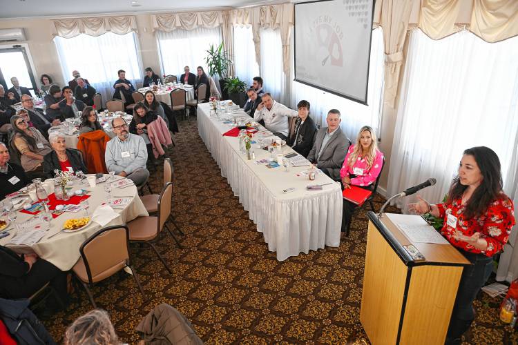 Hannah Rechtschaffen, director of the Greenfield Business Association, tells those in attendance at the Franklin County Chamber of Commerce breakfast about her job. The breakfast was held at Terrazza Ristorante in Greenfield.