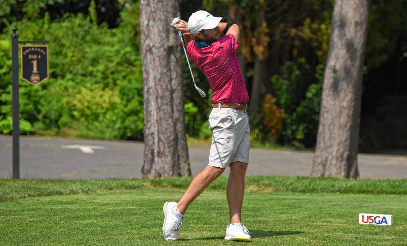 Greenfield’s Justin Dion watches his tee shot on the first hole during qualifying for the 2025 U.S. Amateur Four-Ball Championship held at Orchards Golf Club in South Hadley on Monday.
