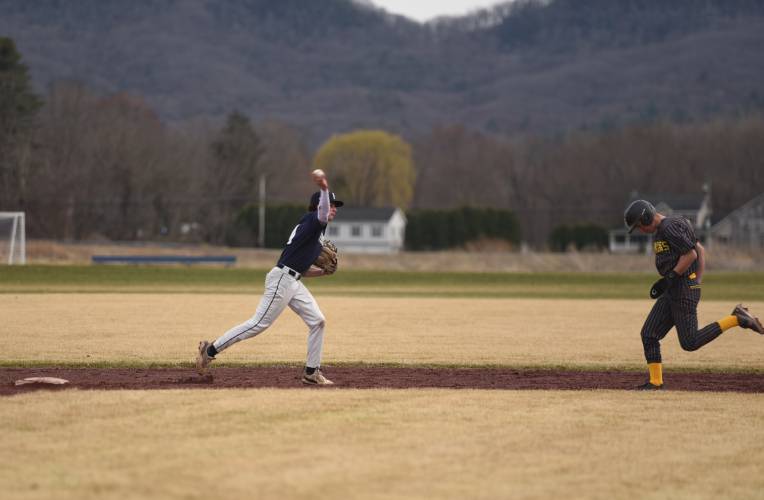 Frontier Regional’s Austin D’Urso turns a double play during the Redhawks’ victory over Hopkins on Wednesday afternoon in Hadley.