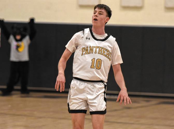 Pioneer’s Brayden Thayer (10) watches his 3-point shot go in for the 1,000th point of his career during the Panthers’ 65-37 win over Fenway in the MIAA Division 5 Round of 32 on Friday night at Messer Gymnasium in Northfield.