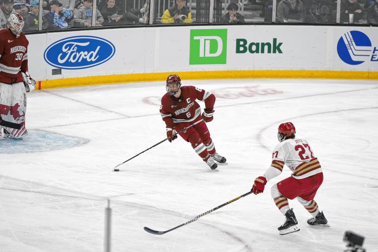 UMass' Ryan Ufko skates with the puck against Boston College in the Hockey East semifinals at TD Garden on Friday. 