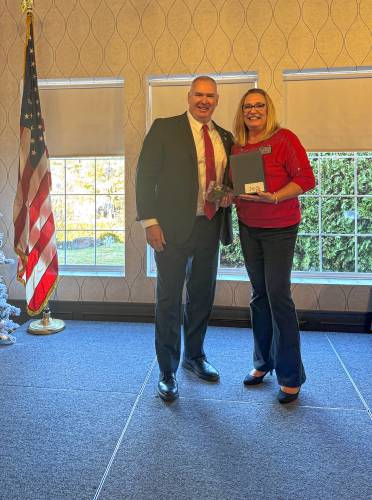 Peter Ruffini, president of the REALTOR Association of Pioneer Valley’s board of directors, and Sue Drumm, president-elect. Ruffini received the REALTOR of the Year award during the association’s holiday luncheon on Dec. 12.