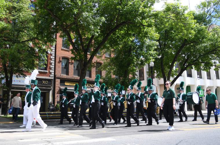 The Greenfield High School Band on Main Street during Memorial Day activities in Greenfield Monday.