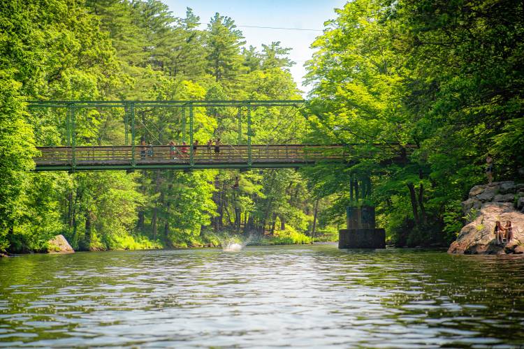 The Mineral Road truss bridge spans the Millers River.