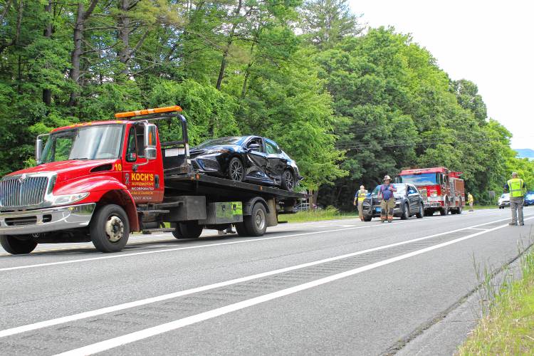 The Northfield Police and Fire departments responded to Route 10 in Northfield at 11:30 a.m. Tuesday after a two-vehicle collision sent two drivers to Baystate Franklin Medical Center in Greenfield to be treated for non-life-threatening injuries. As of around noon, a black Toyota Camry was being towed from Route 10 as police and firefighters blocked off a portion of the state highway near Northfield Mount Hermon school. According to Northfield Fire Chief Floyd “Skip” Dunnell III, the driver of the Toyota was headed westbound and struck the side of another vehicle that was turning onto Route 10 from Main Road. The Northfield Police and Fire departments responded to Route 10 in Northfield at 11:30 a.m. Tuesday after a two-vehicle collision sent two drivers to Baystate Franklin Medical Center in Greenfield to be treated for non-life-threatening injuries. As of around noon, a black Toyota Camry was being towed from Route 10 as police and firefighters blocked off a portion of the state highway near Northfield Mount Hermon school. According to Northfield Fire Chief Floyd “Skip” Dunnell III, the driver of the Toyota was headed westbound and struck the side of another vehicle that was turning onto Route 10 from Main Road.