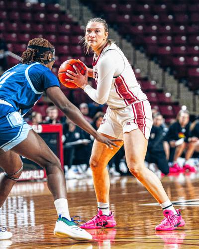 UMass forward Megan Olbrys (11) squares up at the top of the key during the first half of the Minutewomen’s 42-40 loss to Rhode Island on Sunday afternoon in Amherst.