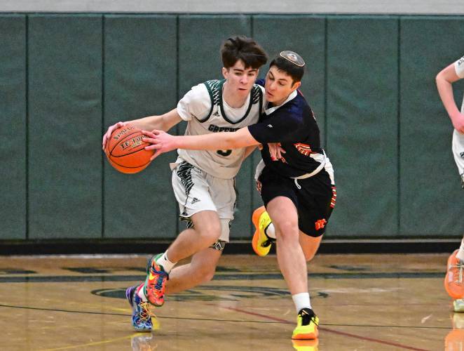Greenfield’s Gavin Arsenault is harassed by Maimonides’ Ariel Jeselsohn  during a preliminary round contest of the MIAA Div. 4 state tournament on Tuesday at Nichols Gymnasium.  