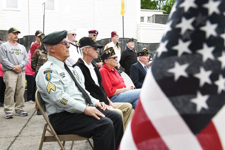 Veterans and others listen to Brig. Gen. Mark Kalin speak at Veterans Mall in Greenfield during ceremonies on Memorial Day in Greenfield Monday.