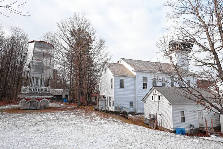 The belfry and cupola from Ashfield Town Hall rests on the ground behind the building, waiting to be repaired and put back.