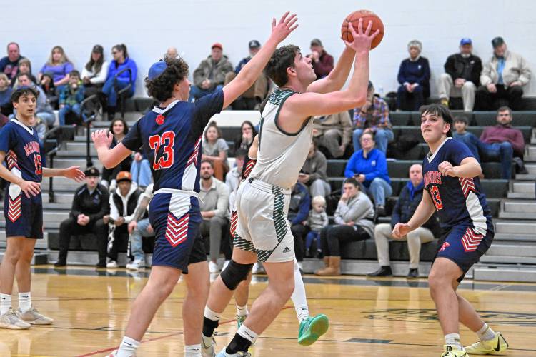 Greenfield’s Jon Breor goes up for a shot against Maimonides  during a preliminary round contest of the MIAA Div. 4 state tournament on Tuesday at Nichols Gymnasium. 