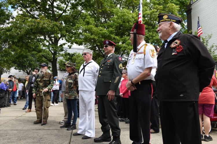 Veterans gather at Veterans Mall in Greenfield before ceremonies on Memorial Day in Greenfield Monday.