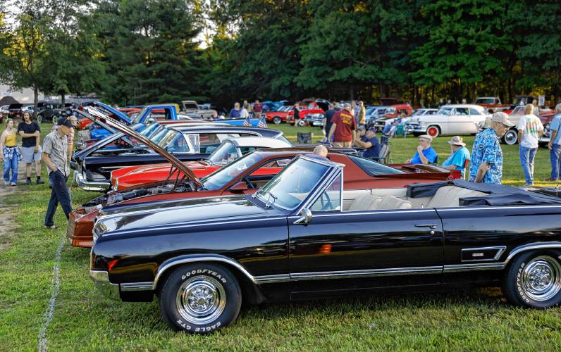Attendees check out the 151 antique vehicles gathered for the weekly Friday Cruise Night at Tom’s Long Hot Dogs in Whately. The show takes place every Friday night, from 5 p.m. until dusk, through Sept. 6, weather permitting. There are no rain dates. Tom’s is located at 61 State Road.