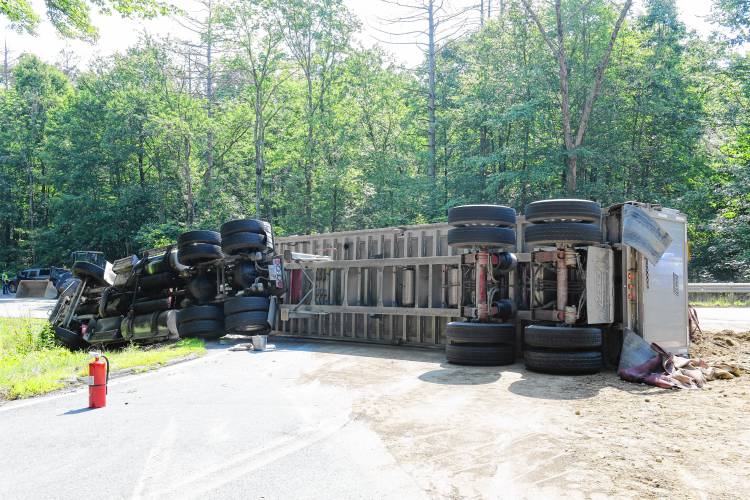A tractor-trailer truck hauling a load of dirt crashed at the base of Prescott Road in Shutesbury on Monday morning, dumping part of the load onto Daniel Shays Highway (Route 202). According to officers on scene, the driver reportedly escaped any serious injuries, but the trailer blocked Prescott Road completely, rerouting traffic in Shutesbury Center.