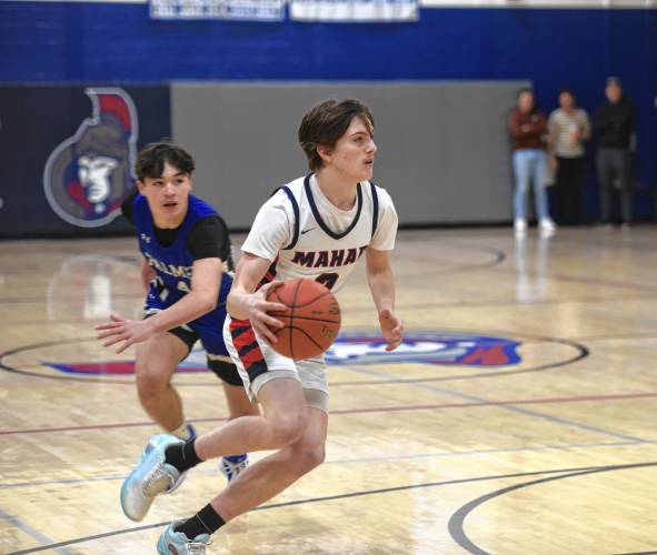 Mahar's Morgan Softic drives to the rim against Palmer during a Western Mass. Class C quarterfinal contest in Orange on Friday. 