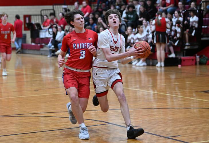 Athol’s Ben Kearney drives to the basket against Hampshire earlier this season at Mallet Gymnasium. Athol’s Ben Kearney drives to the basket against Hampshire earlier this season at Mallet Gymnasium.