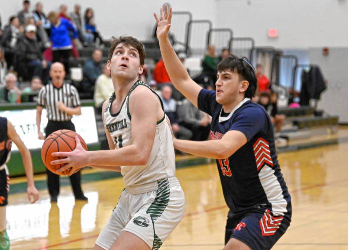 Greenfield’s Jonathan Breor looks to shoot against Maimonides  during a preliminary round contest of the MIAA Div. 4 state tournament on Tuesday at Nichols Gymnasium. 