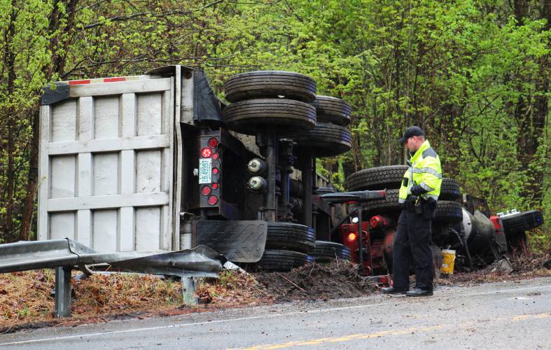 A man was taken by ambulance to Baystate Medical Center in Springfield on Monday after the 18-wheeler he was driving careened through the intersection of Daniel Shays Highway (Route 202) and Prescott Road in Shutesbury, crashed through a guardrail and rolled onto its side.