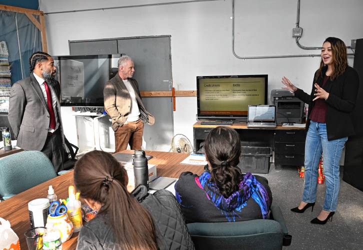 Jetari Veal, Glenn Davis and Catherine Comerford from Workers Credit Union run a personal finance class at LaunchSpace in the Orange Innovation Center. 
